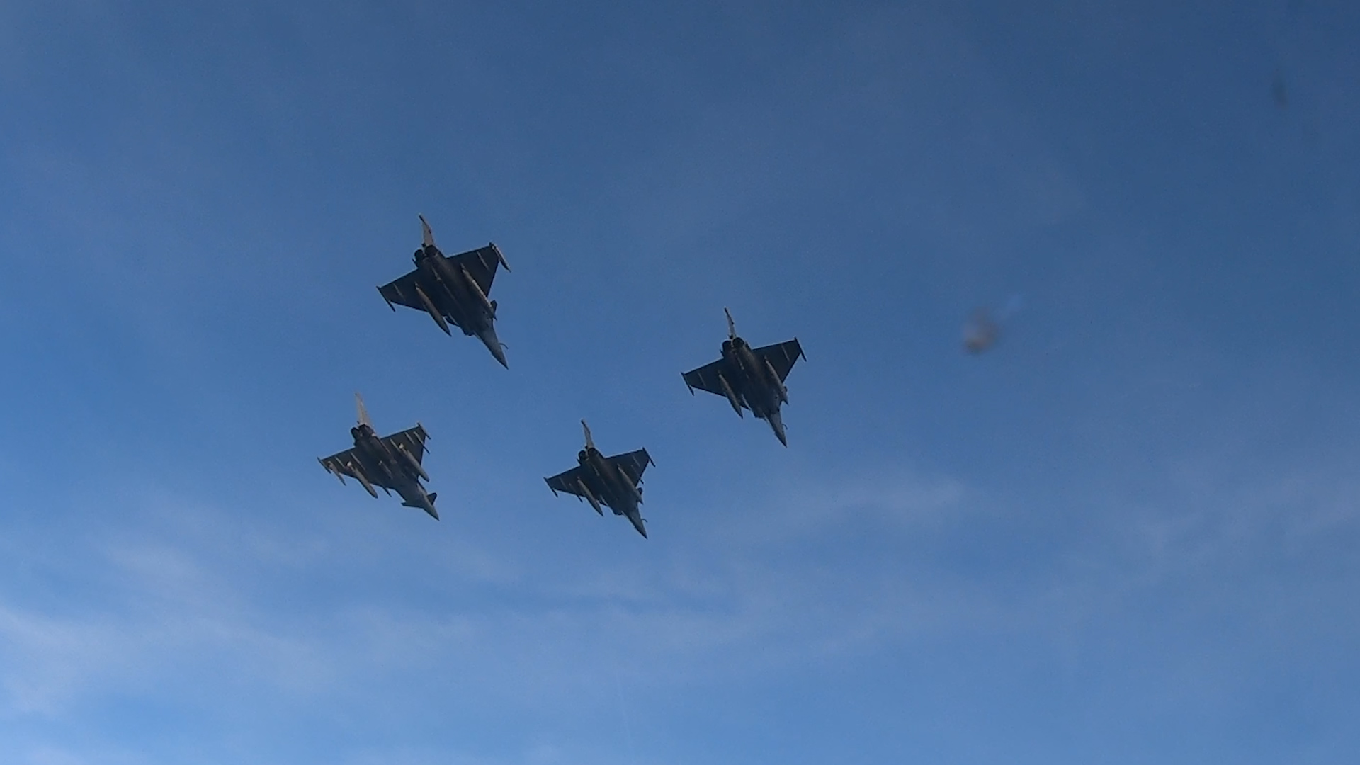 Image shows four RAF Typhoon flying in formation.